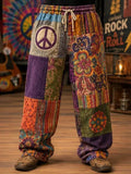 Men's Patchwork Blocks With Peace Sign And Floral Art Print Pants